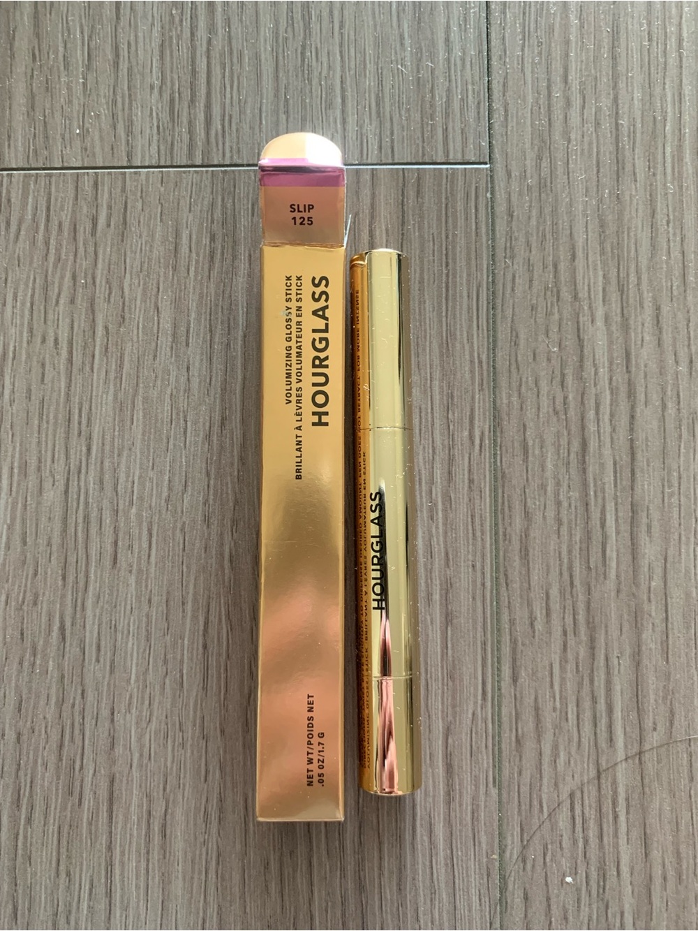 Hourglass Brilliant Aura Volumizing Gloss Stick - Gold Packaging